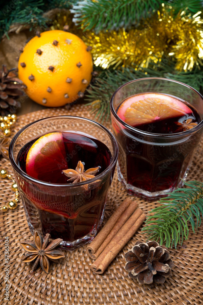two glasses of mulled wine with spices two glasses of mulled wine with spices