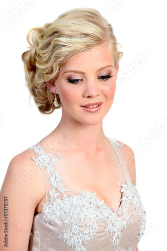 Beautiful  young blond woman in evening dress.