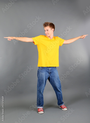 Handsome young man dancing ...