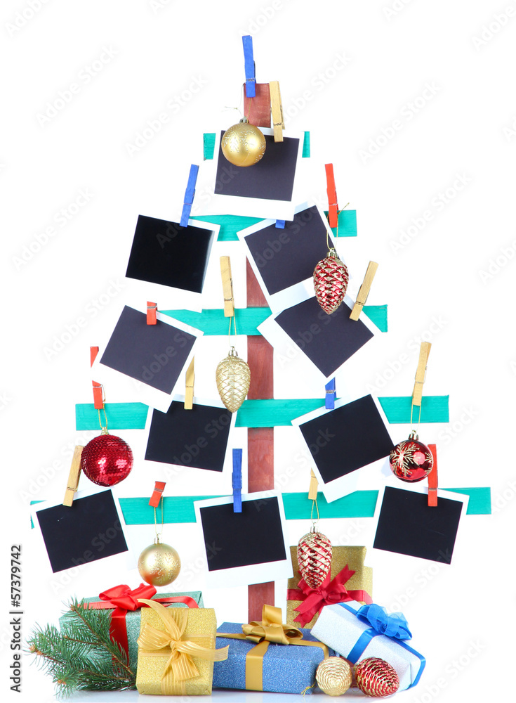 Wooden hand made fir tree with empty photo paper and Christmas Wooden hand made fir tree with empty photo paper and Christmas