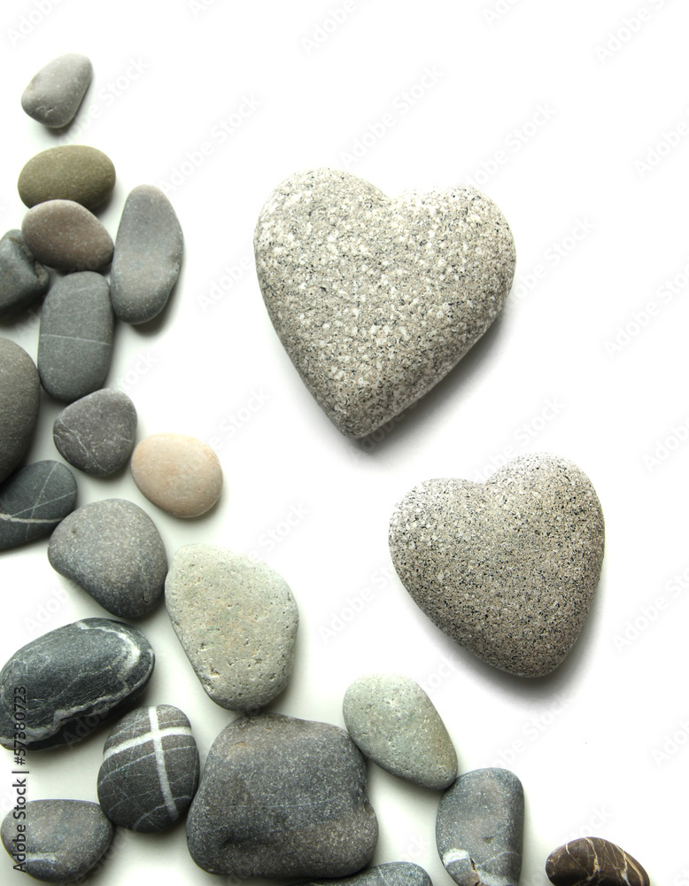 Grey stones in shape of heart, isolated on white Grey stones in shape of heart, isolated on white
