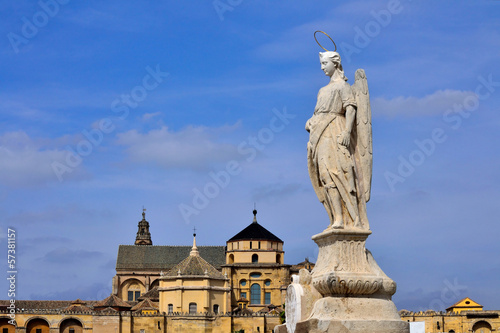 Canvas Print St.Raphael Statue with Mosque of Cordoba in background