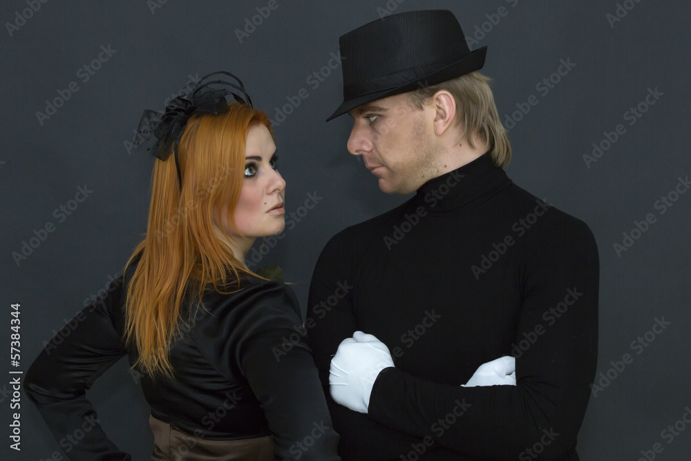 Obraz premium Witch and Mephistopheles on a dark background