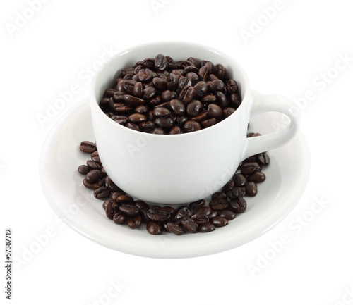 Cup of coffee beans on white background.