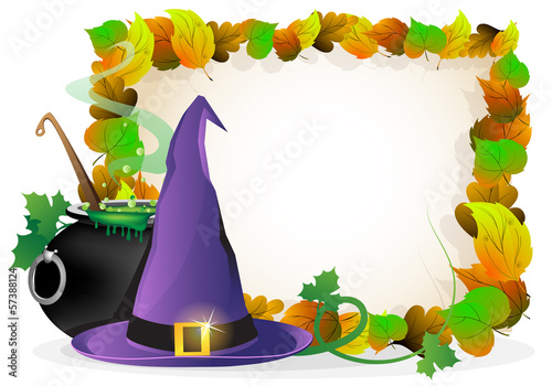 Witch hat and  cauldron on autumn leaves background