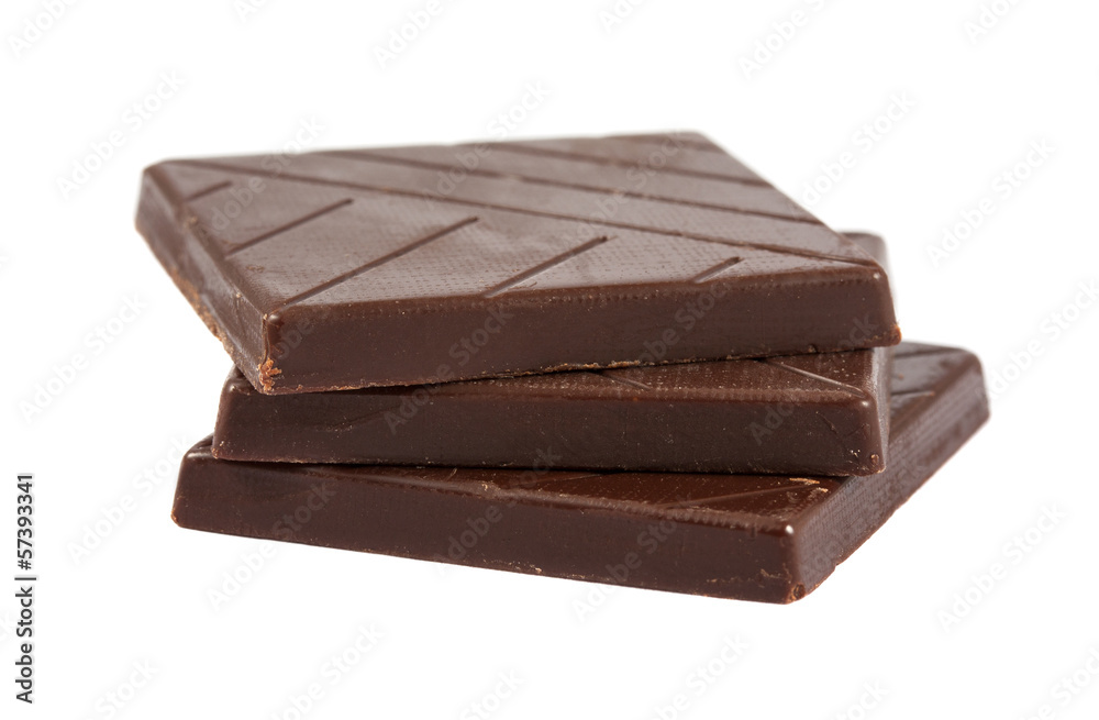 Three brown chocolate pieces Three brown chocolate pieces