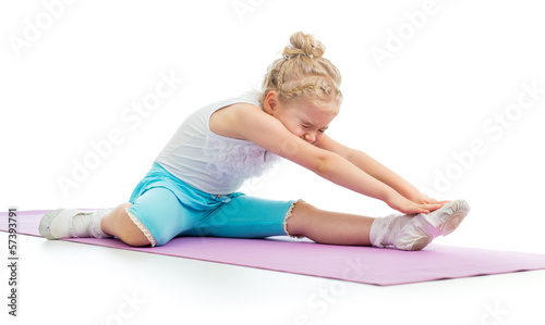 Kid girl doing fitness exercises