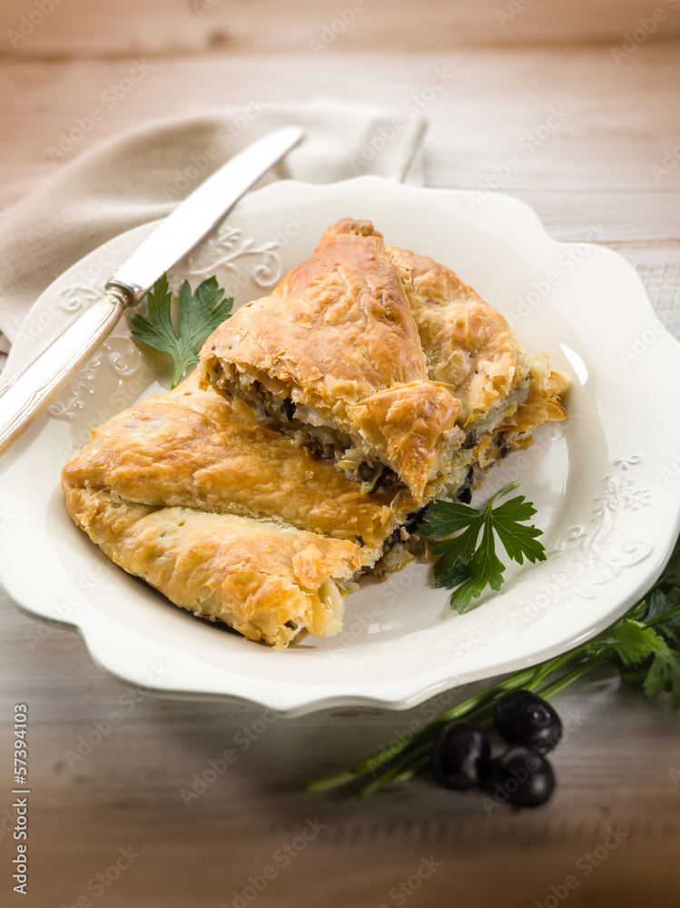 strudel stuffed with tuna and black olives, selective focus strudel stuffed with tuna and black olives, selective focus