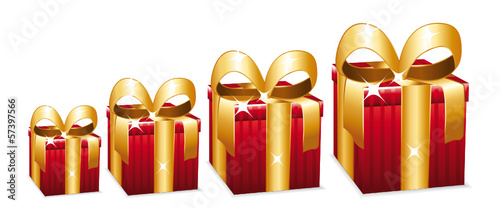Beautiful red gift boxes with large golden bow.