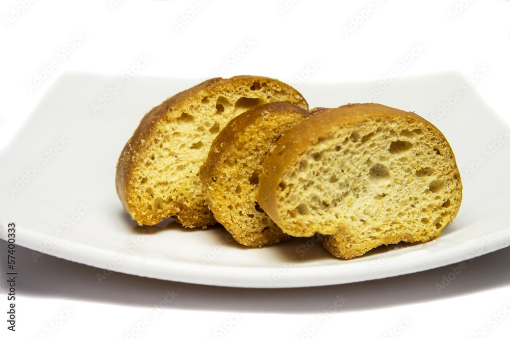 Three biscuits in plate