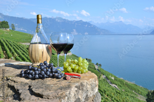 Red wine and grapes. Terrace vineyards in Lavaux region, Switzer