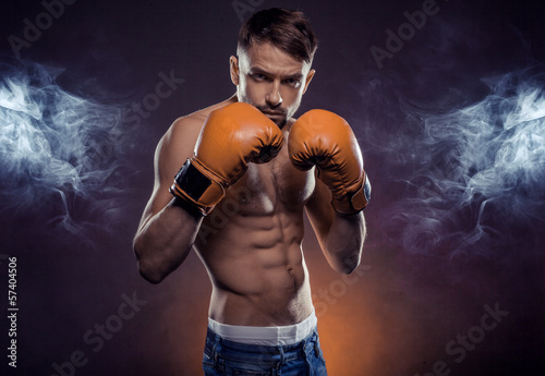 man wearing boxing gloves © stryjek