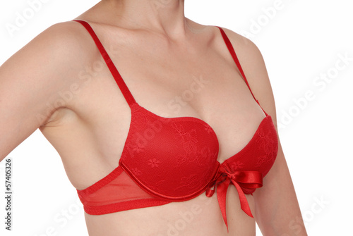 red brassiere is on woman's bust