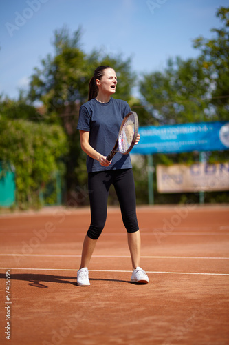 Tennis instructor teaching © Xalanx