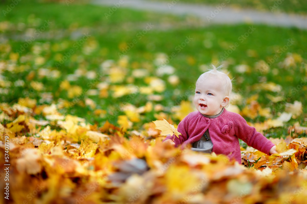 Adorable girl having fun on beautiful autumn day Adorable girl having fun on beautiful autumn day