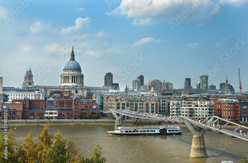 Fototapeta Naklejka Na Ścianę i Meble -  urban landscape with Millennium Bridge in London