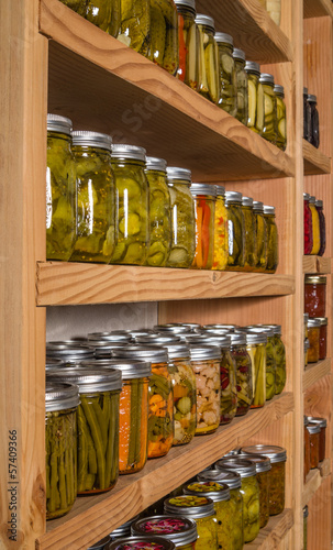 Storage shelves with canned goods