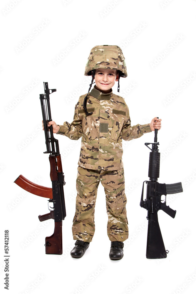 Fototapeta premium Young soldier with rifle