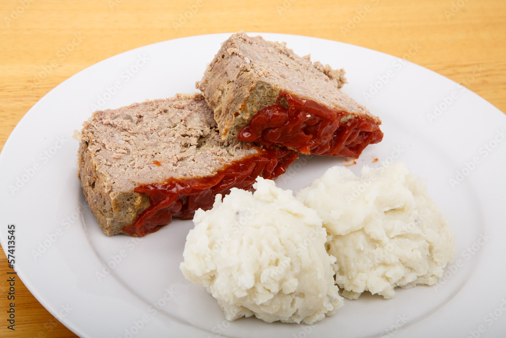 Meat Loaf and Mashed Potatoes on a White Plate Meat Loaf and Mashed Potatoes on a White Plate