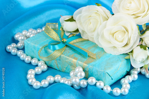 Romantic parcel on blue cloth background