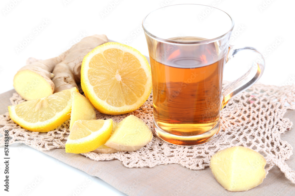 Cup of tea with ginger on napkin isolated on white Cup of tea with ginger on napkin isolated on white
