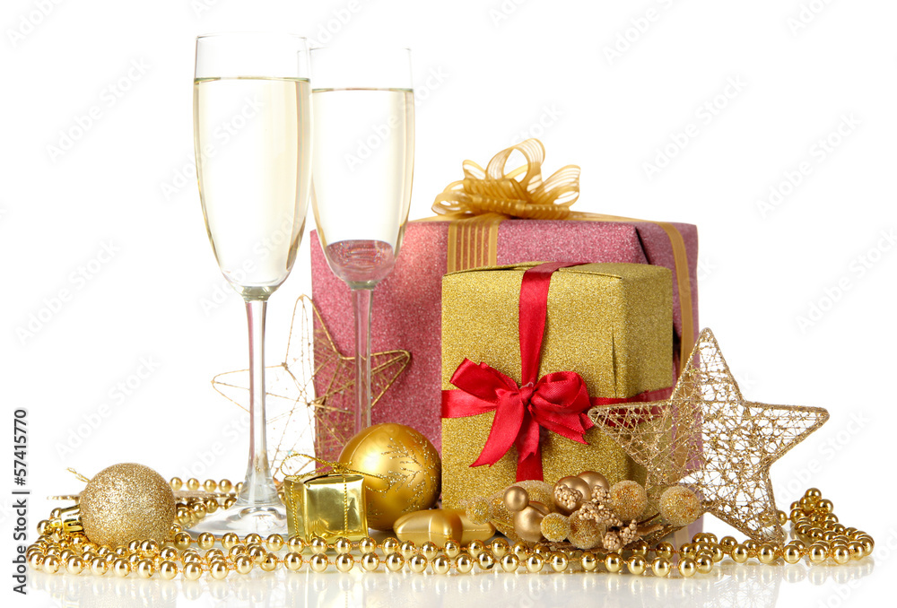 Glasses of champagne with gift boxes isolated on white Glasses of champagne with gift boxes isolated on white