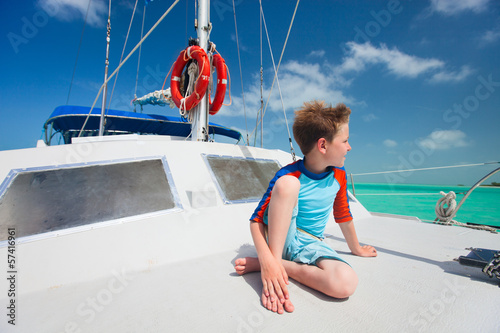 Little boy at luxury yacht