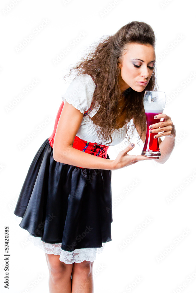 young and beautiful woman in a traditional Bavarian dress young and beautiful woman in a traditional Bavarian dress