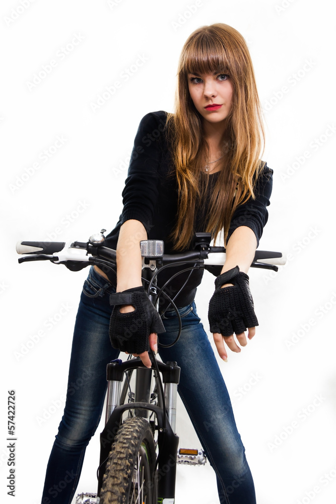 The young girl with bike. The young girl with bike.