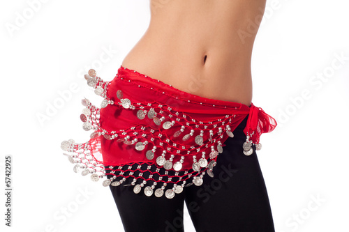 Belly Dancer Wearing a Red Coin Belt and Shaking her Hips photo