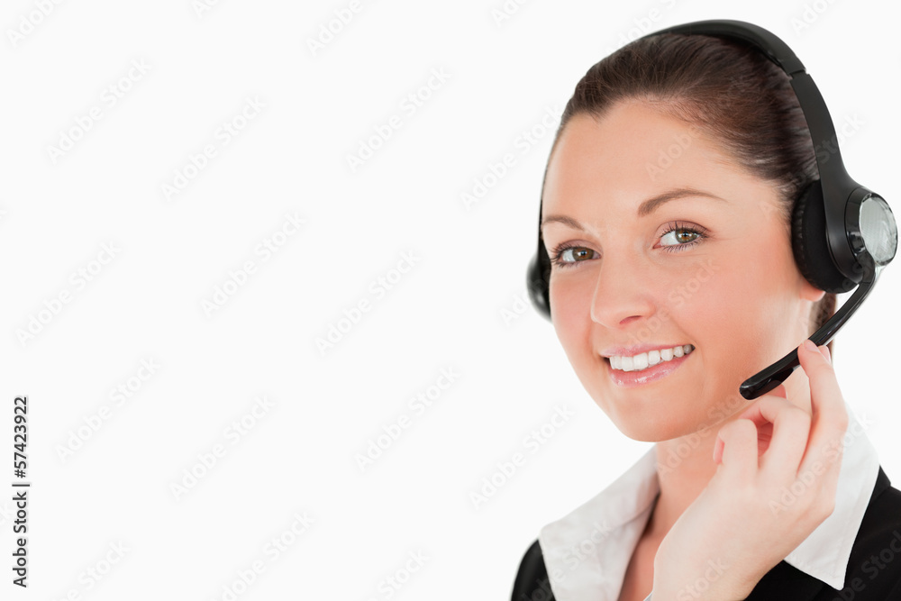 Portrait of a gorgeous woman in suit using headphones and posing Portrait of a gorgeous woman in suit using headphones and posing
