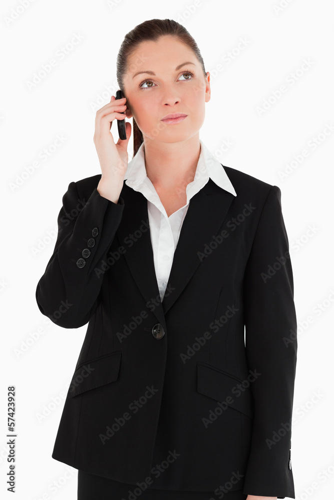 Good looking woman in suit on the phone Good looking woman in suit on the phone