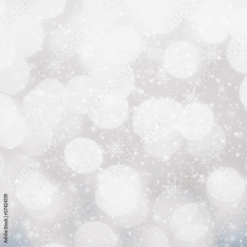 Defocused silver and white Christmas Bokeh background with snowf