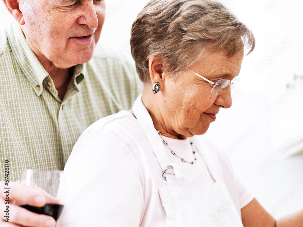 senior couple cooking together
