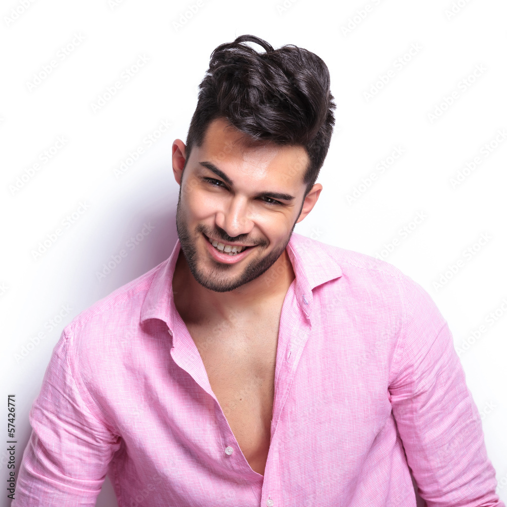 Fototapeta premium young fashion man smiles for you