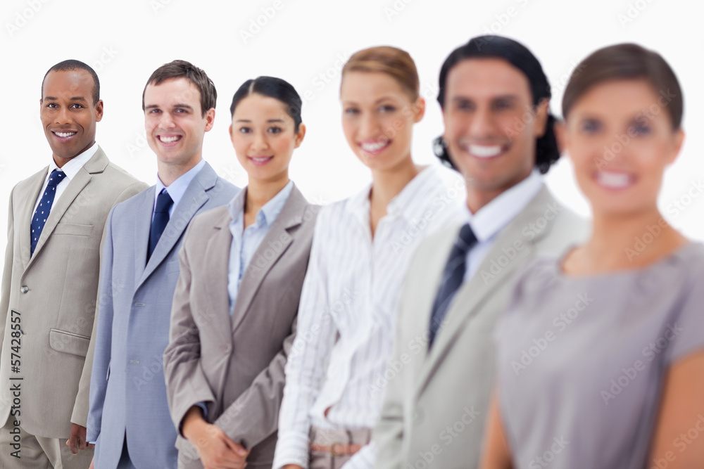 Close-up of happy business people looking straight Close-up of happy business people looking straight