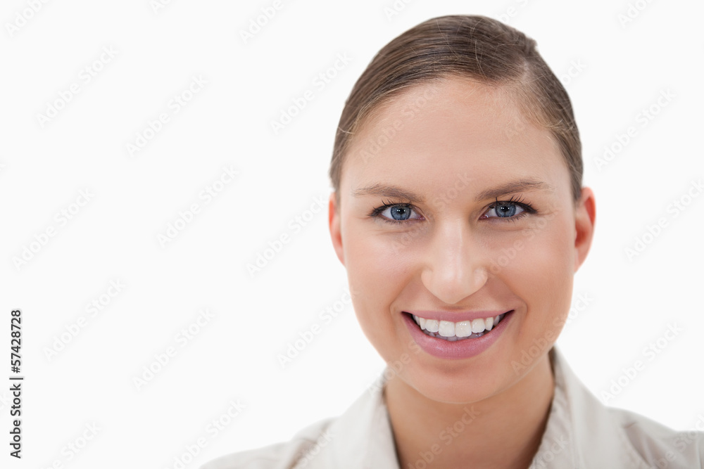 Close up of a businesswoman smiling at the camera Close up of a businesswoman smiling at the camera