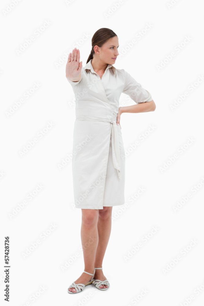 Portrait of a businesswoman making a stop sign Portrait of a businesswoman making a stop sign
