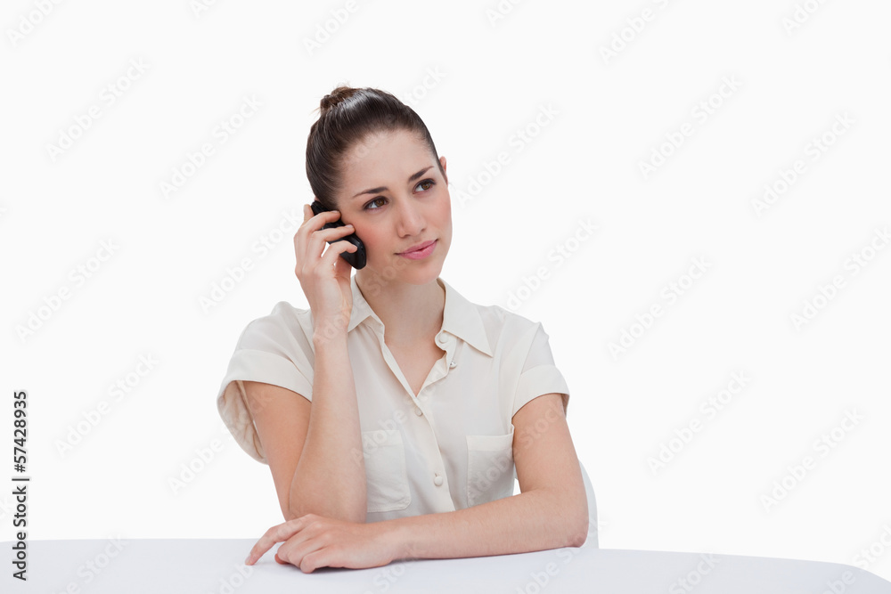 Young businesswoman making a phone call
