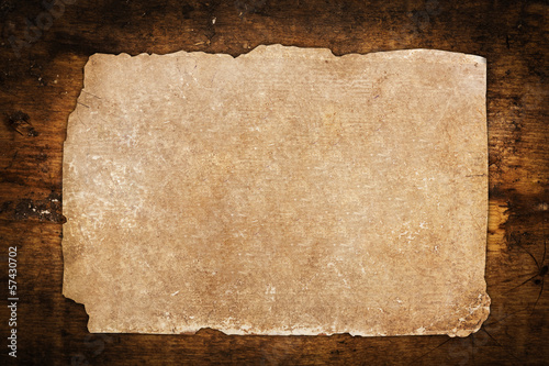Vintage paper sheet on wood