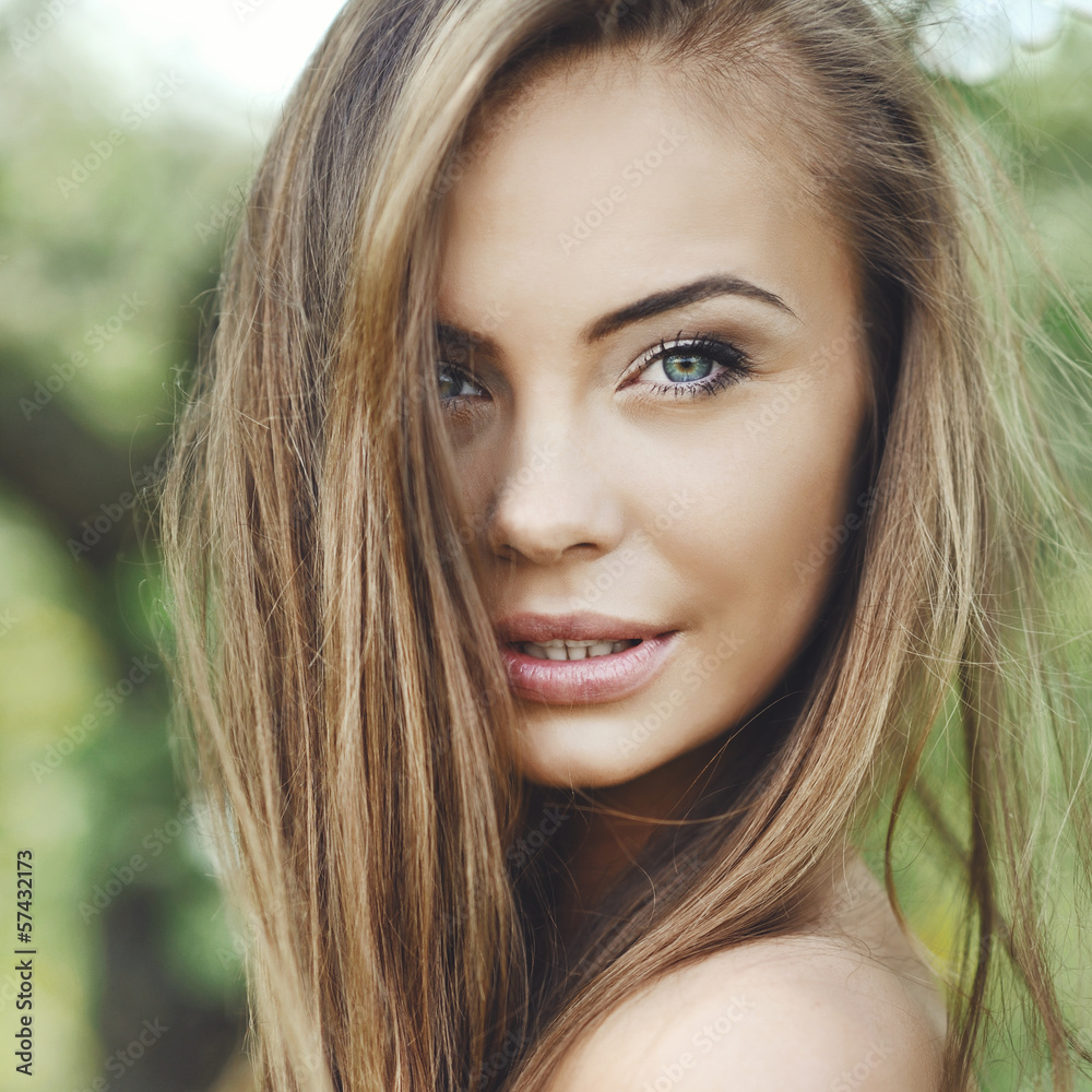 Close up of a beautiful girl face - outdoor portrait