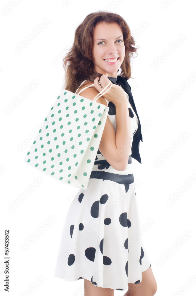 Girl after good shopping on white