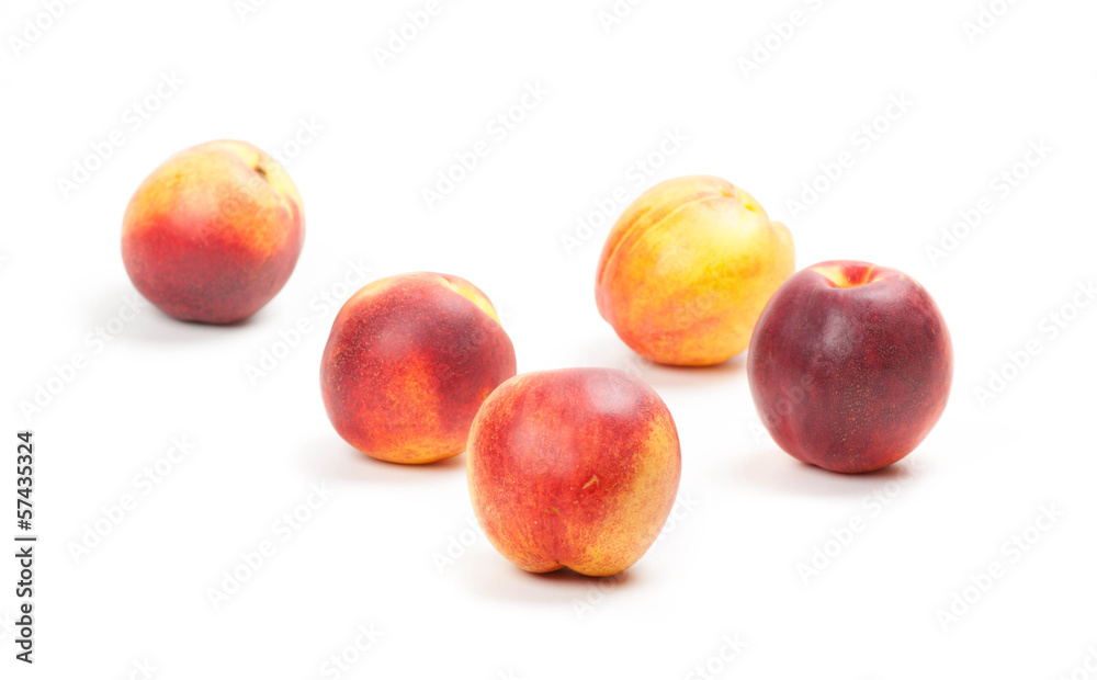 Ripe peaches fruits isolated on white Ripe peaches fruits isolated on white
