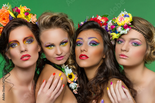 Beautiful girls wearing flower accessories