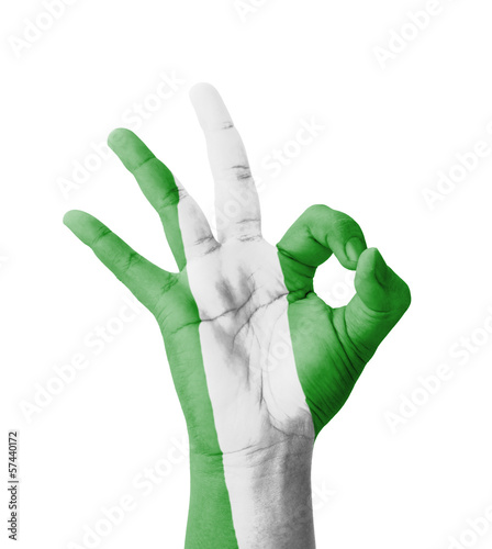 Hand making Ok sign, Nigeria flag painted
