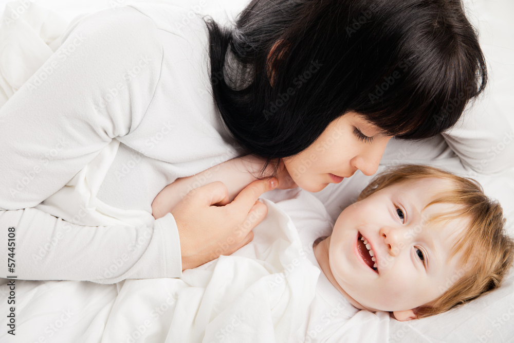 happy family. Mother with baby playing and smiling happy family. Mother with baby playing and smiling