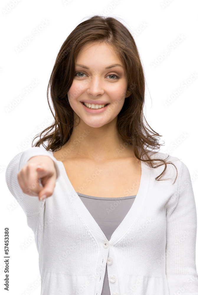 Half-length portrait of young girl pointing with hand Half-length portrait of young girl pointing with hand
