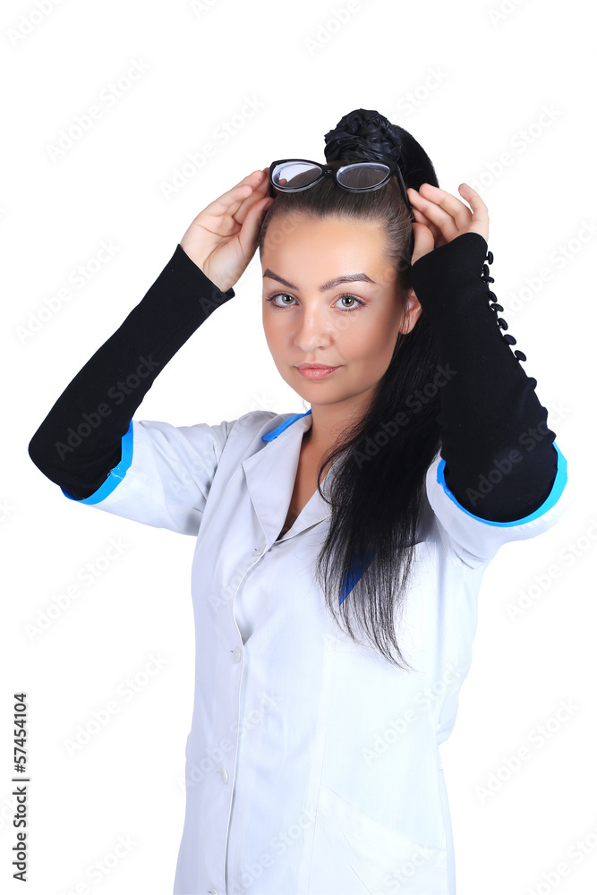 A portrait of a sexy beautiful female brunette doctor in a white A portrait of a sexy beautiful female brunette doctor in a white