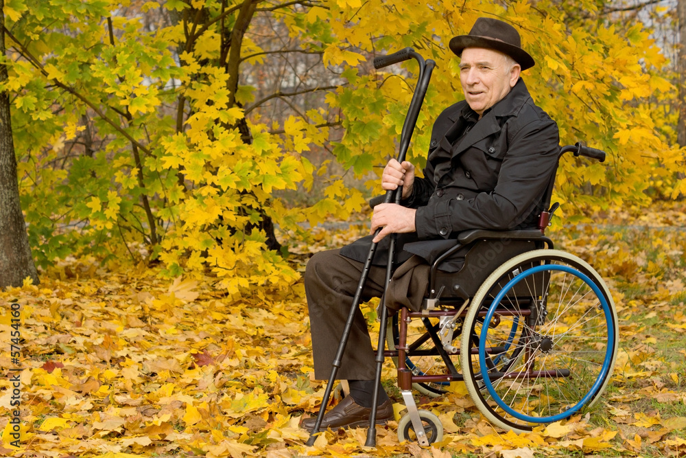 Disabled senior man in a wheelchair Disabled senior man in a wheelchair