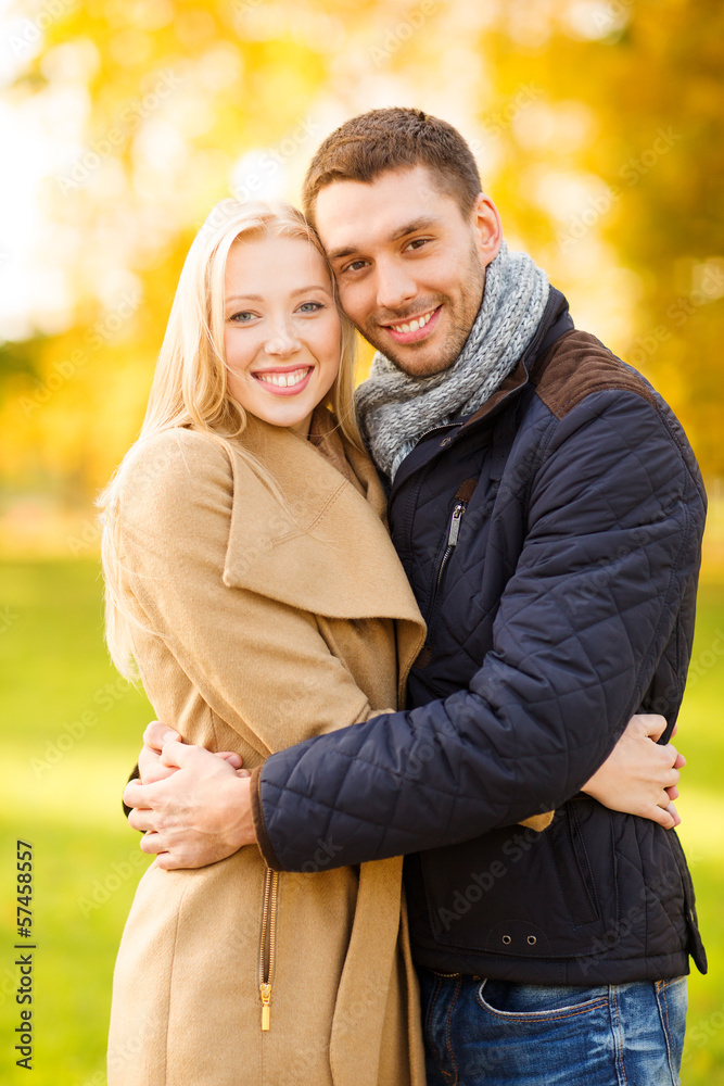 romantic couple in the autumn park romantic couple in the autumn park